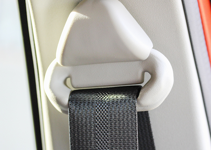 Seat belt through anchor