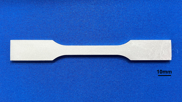 Sintered JIS-2 dumbbell fabricated using TENAC™-P PT220 (unpolished)